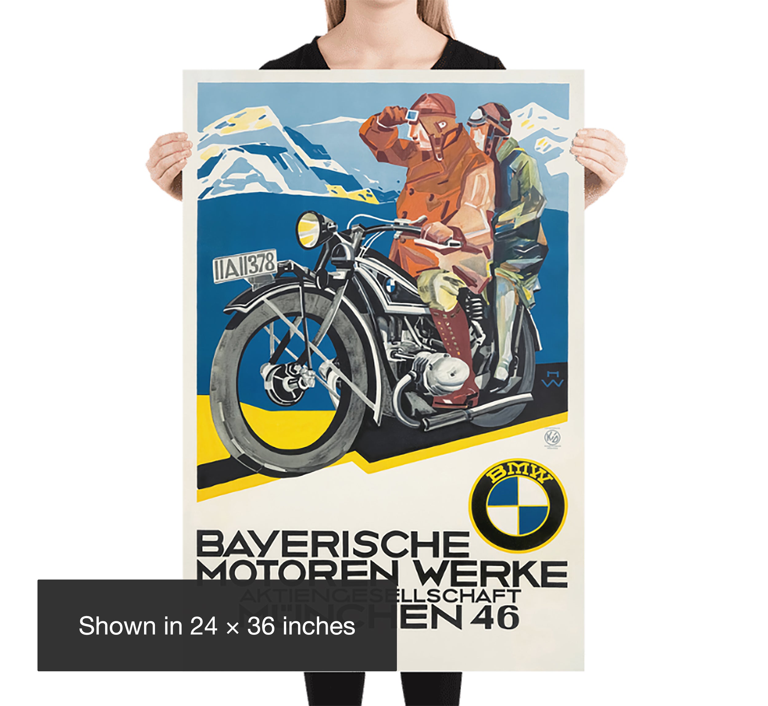Person holding the vintage BMW motorcycle poster in 24 by 36 inch size for scale reference.
