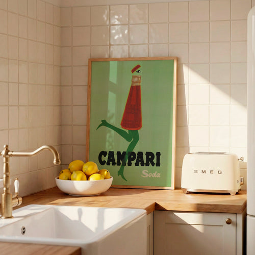 Vintage Campari Soda poster displayed in a bright kitchen interior, Italian aperitif wall art for kitchen decor.