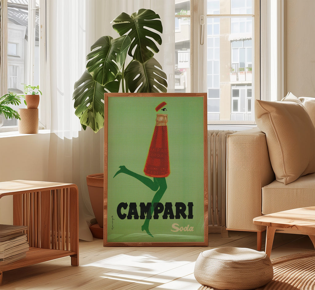 Campari Soda vintage advertising poster styled in a modern living room with natural light and indoor plants.