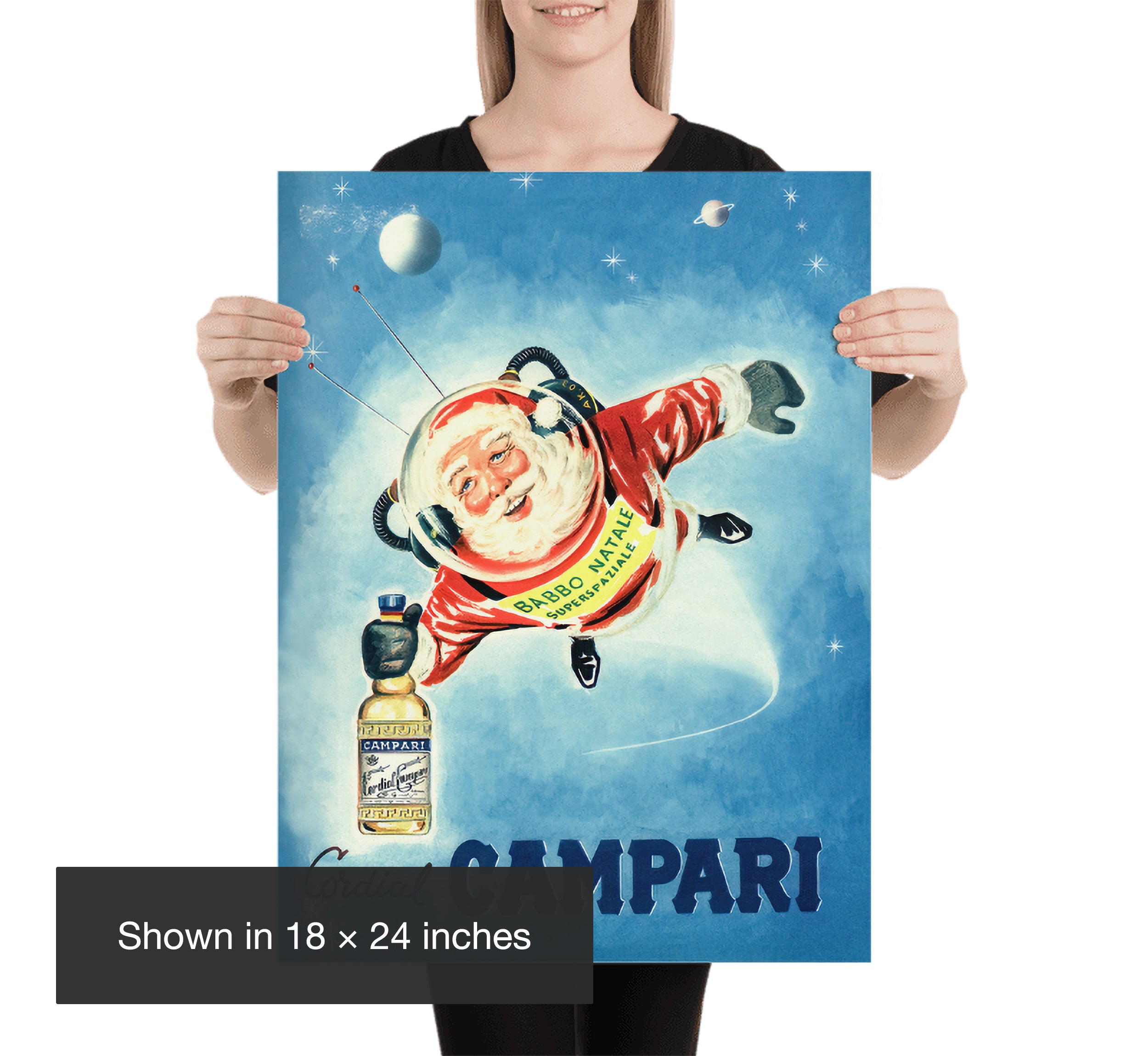 Person holding an 18 × 24 inch Cordial Campari Space Santa poster, providing a clear scale reference for the vintage Italian advertising print.
