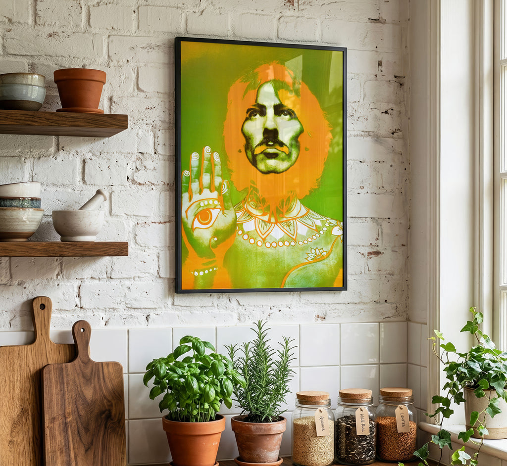 George Harrison by Richard Avedon displayed as framed wall art in a bright contemporary kitchen.