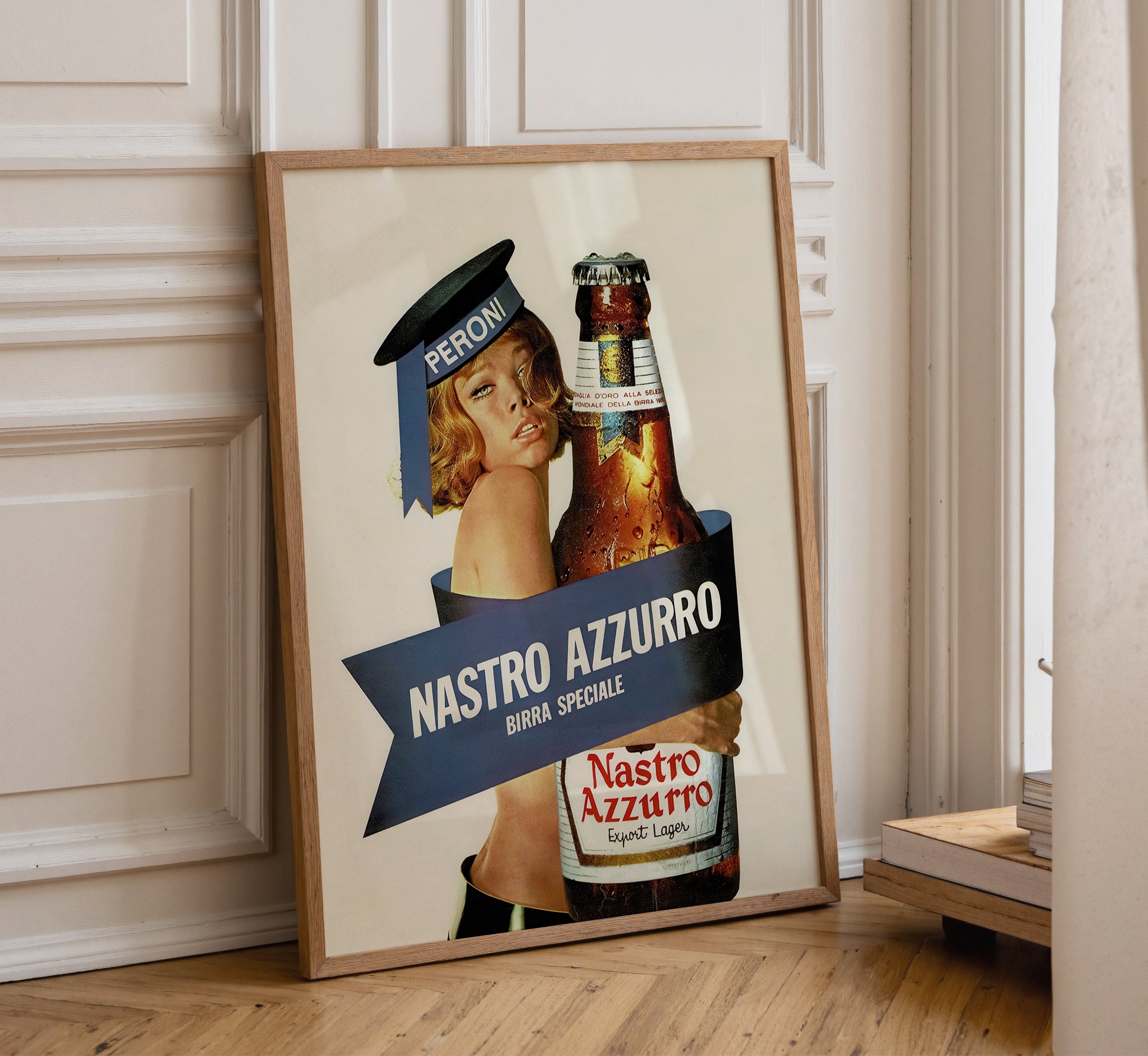 Vintage Nastro Azzurro beer advertising poster attributed to Armando Testa displayed in a natural wood frame.