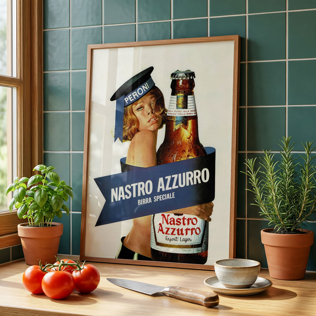 Framed vintage Nastro Azzurro beer advertisement decorating a modern kitchen with Italian-inspired styling.