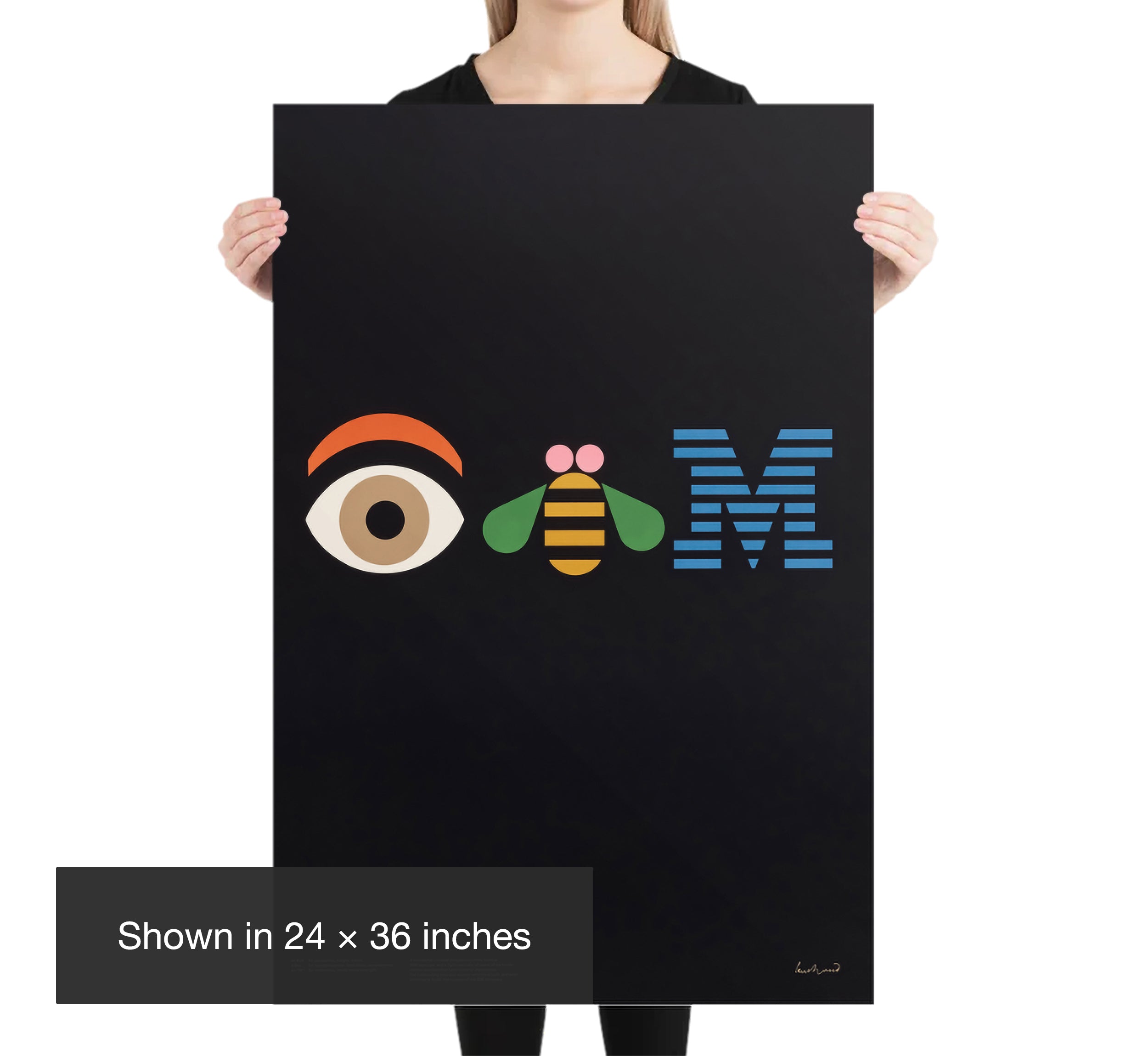 Large Eye Bee M poster by Paul Rand shown at 24 by 36 inch scale for size reference.
