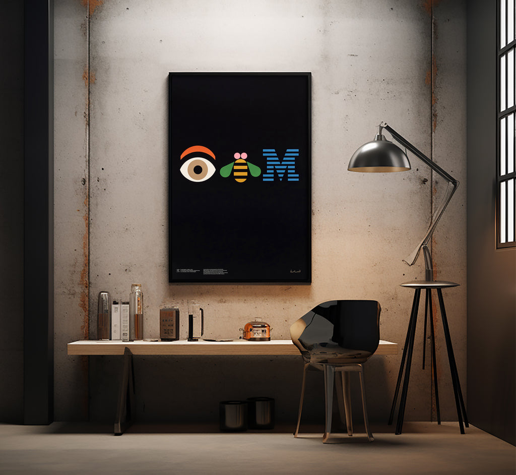 Paul Rand Eye Bee M poster displayed in a modern industrial office and design studio interior.