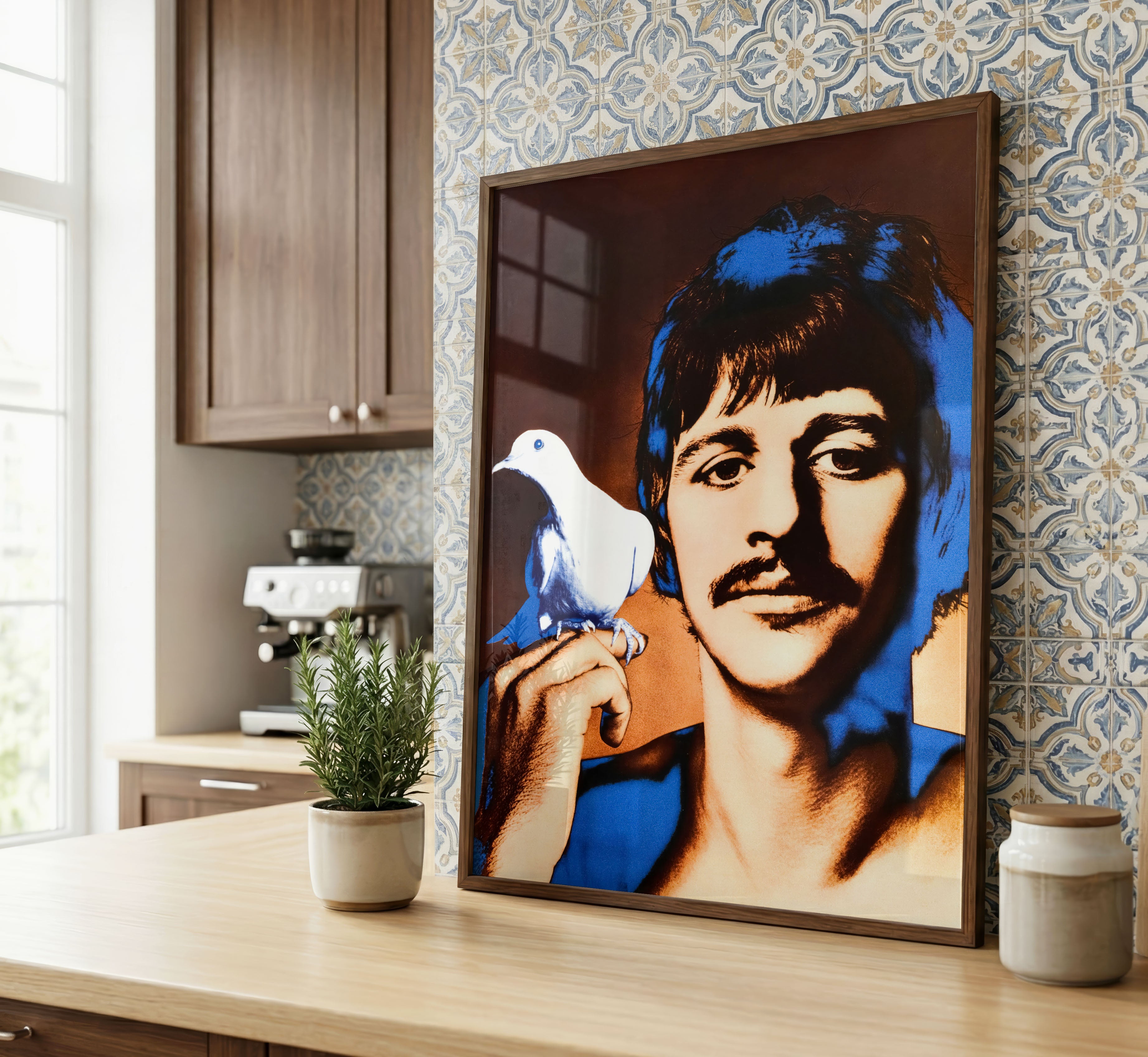 Richard Avedon Ringo Starr poster displayed in a stylish kitchen interior with blue patterned tiles.