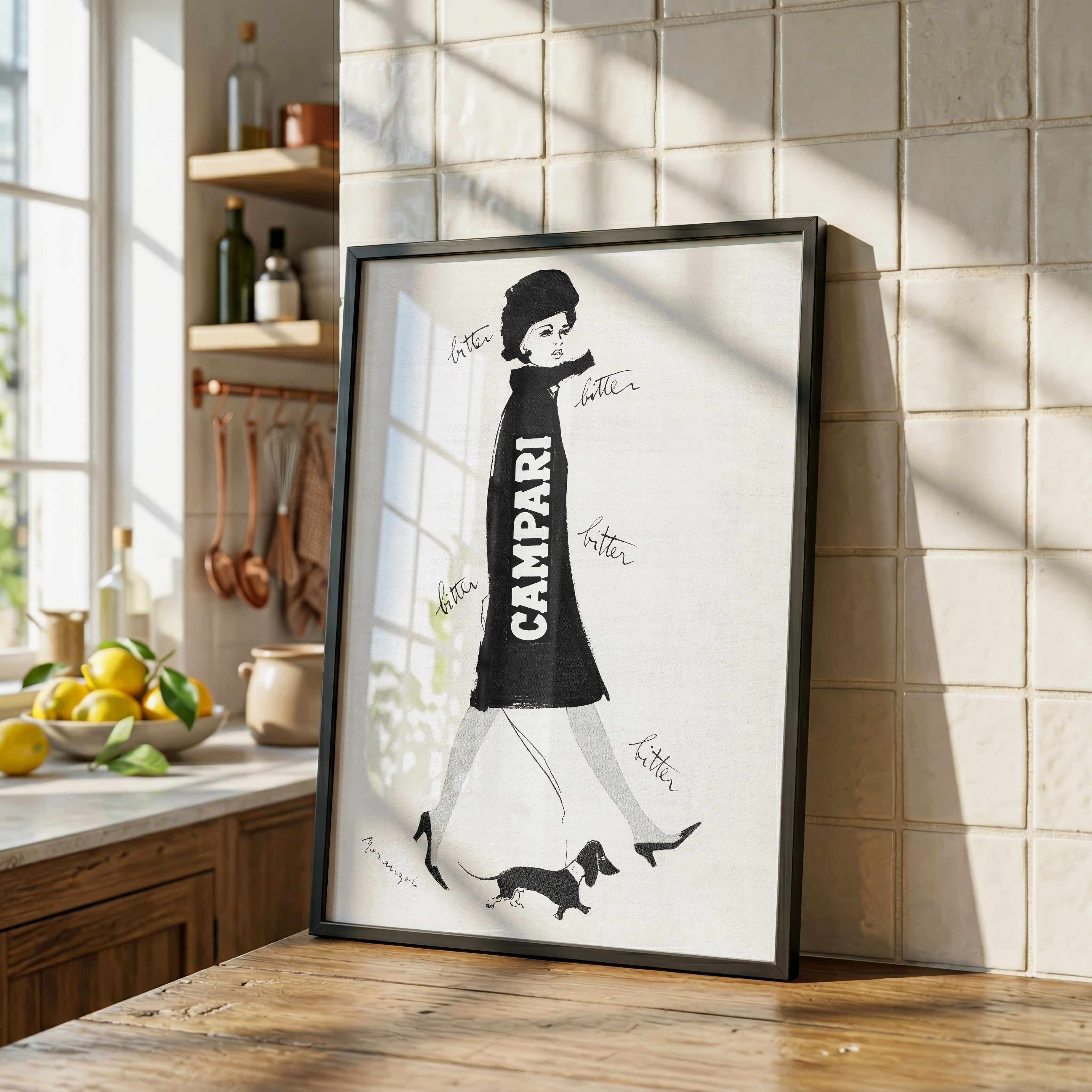The Campari Woman & Dachshund framed artwork displayed in a modern Italian kitchen