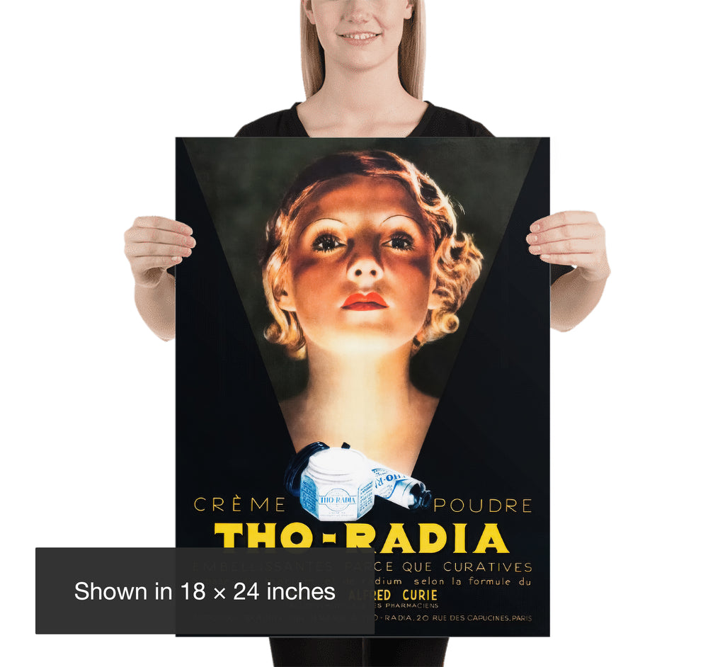 Woman holding an 18 x 24 inch Tho-Radia poster featuring a dramatic 1930s French beauty advertisement.
